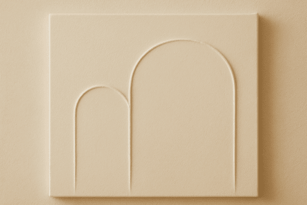 Neutral plaster wall art with minimalist arch shapes